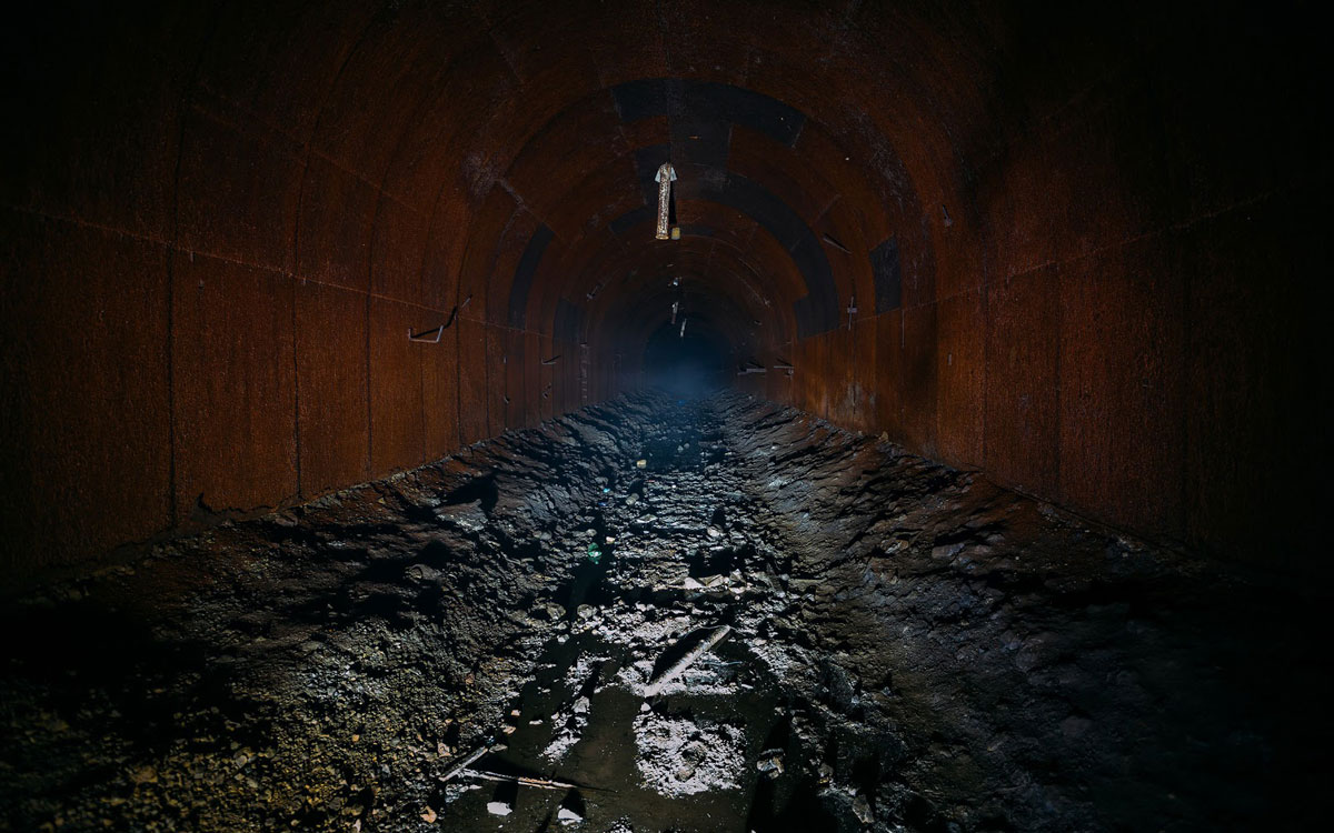 Inside a large sewage pip